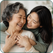 A grandmother laughing with her granddaughter